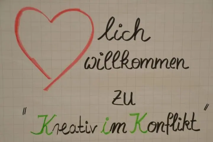 Flipchart mit Begrüßung zum Workshop